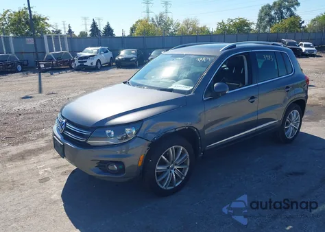 2014 Volkswagen Tiguan Sel из США, поврежденный, VIN WVGBV3AX5EW560328